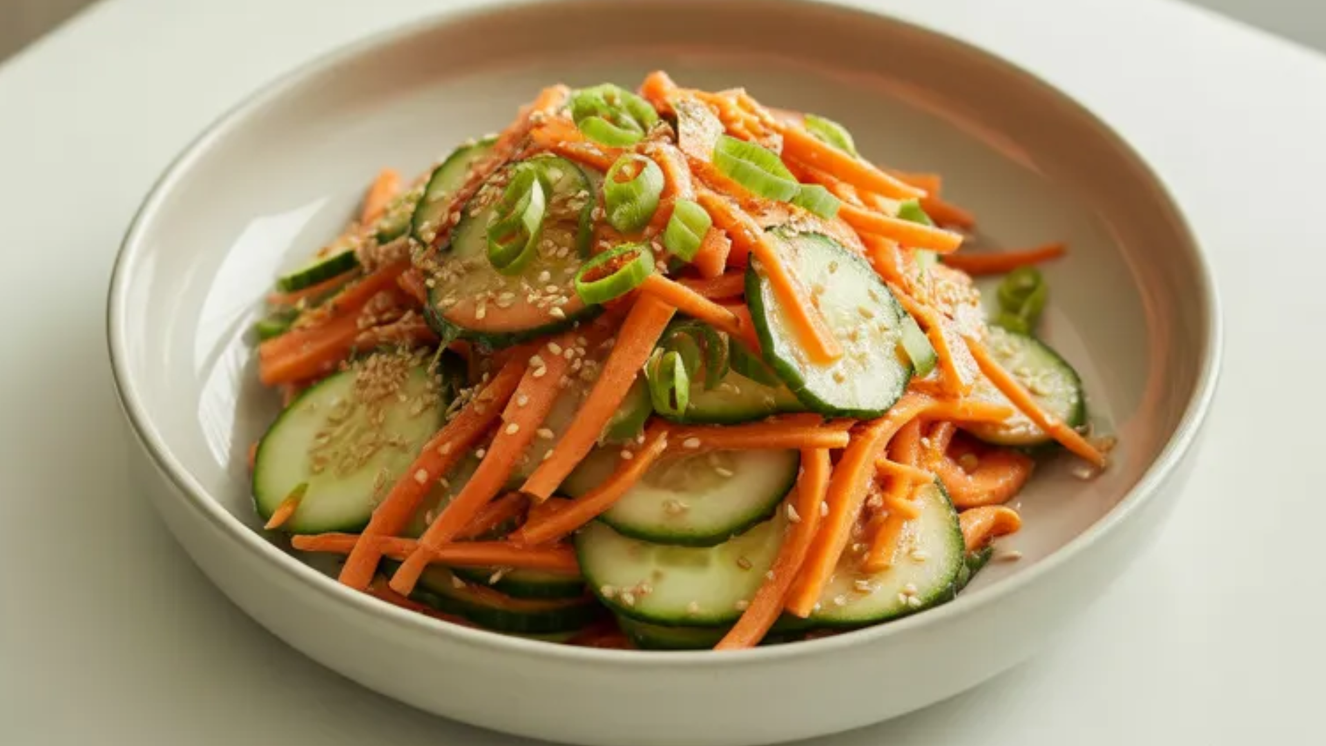 Craving something fresh and healthy this carrot and cucumber salad is light refreshing and super easy to make perfect for summer meals or quick dinners